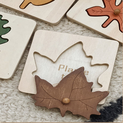 Maple Leaf Puzzle Pieces on Board
